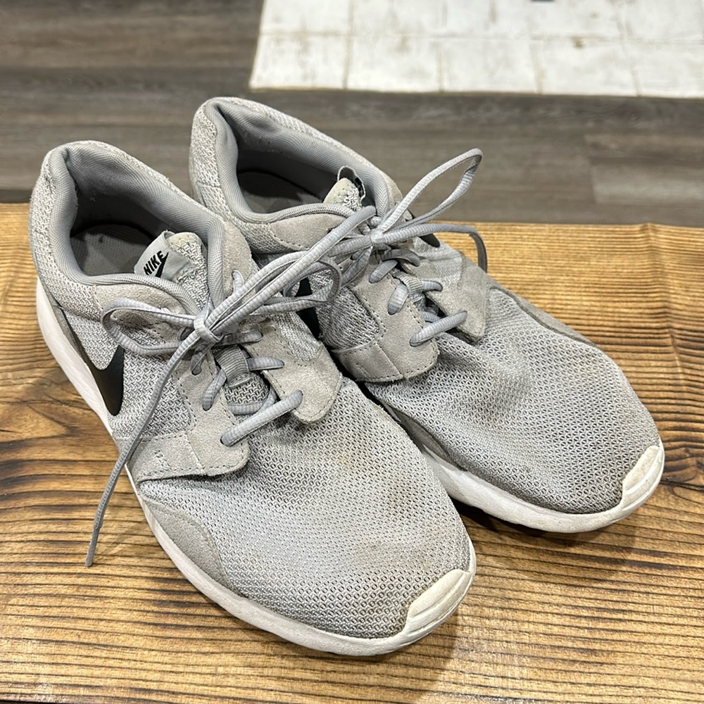 Gray and white nike shoes size 12